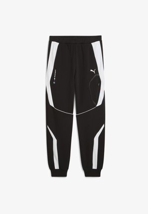 Melni sporta bikses ar baltām akcijām, pieguļoša silueta, elastīga josta un kabata ar rāvējslēdzēju, piedāvā sportisku dizainu un emblēmas.