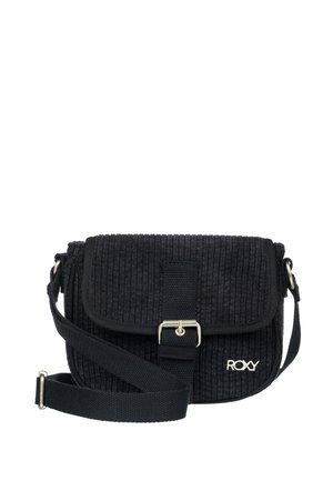 Sac bandoulière en velours côtelé noir avec sangle réglable, rabat avant sécurisé par une boucle métallique et logo "ROXY" dans le coin inférieur droit.