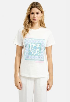 White short-sleeve t-shirt featuring a blue floral print in a square design, with the text "Bonjour" and "SPRZNG" in pink accents.