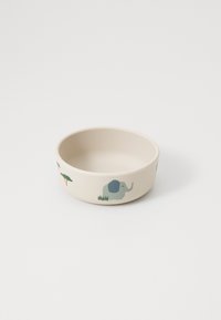Round, beige ceramic bowl featuring an elephant and tree design in green and blue. Smooth texture, shallow depth, suitable for food or objects.