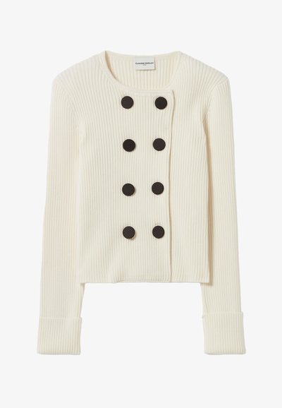 Cardigan court côtelé blanc avec un col rond, six boutons noirs à l'avant et des poignets ajustés. Texture douce.