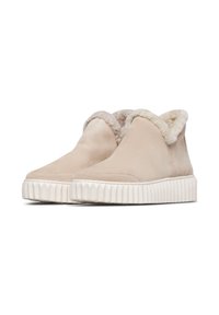 Beige suède enkellaarsjes met een nepbont kraag, voorzien van een gestructureerde witte rubberen zool en een gestroomlijnd ontwerp.