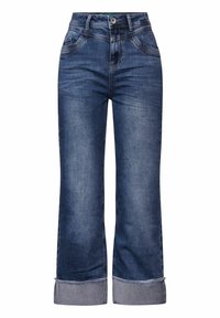 Jeans med utsvängda ben i mörkblå denim, med knäppning, fem fickor och upprullade benslut med fransig kant för textur.