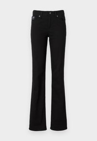 Black flared jeans made of cotton blend fabric. Features a front button closure, five pockets, and a subtle logo label on the waistband.
