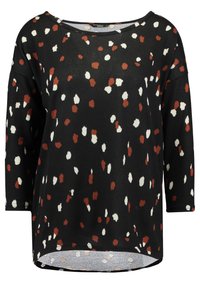 Schwarzer Pullover mit lockerer Passform, der rote und weiße abstrakte Punkte aufweist. Rundhalsausschnitt, Dreiviertelärmel und asymmetrischer Saum.