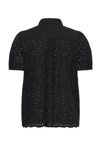 Blouse noire à manches courtes avec broderie œillets en motifs de feuilles, ourlet festonné, et empiècement et col en tissu uni, vue de dos.