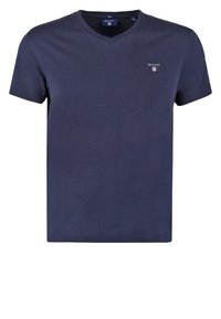 Navyblauwe v-hals t-shirt van katoen. Heeft korte mouwen en een klein geborduurd logo op de linkerborst. Glad van textuur, relaxte pasvorm.