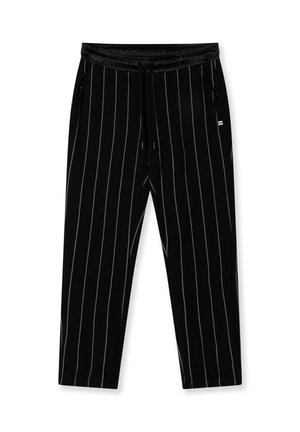 Pantalon de jogging noir à rayures avec une taille à cordon, des poches latérales et une texture lisse. Présente des rayures blanches verticales pour un design additionnel.