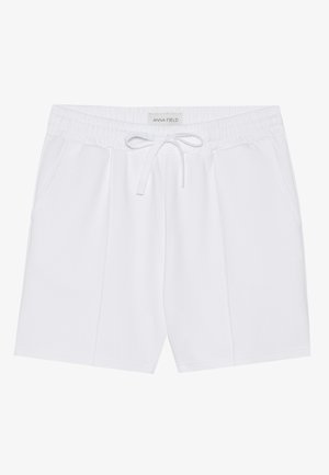 Vita, knä-långa shorts i mjukt tyg, med resårmidja och dragsko samt två sidofickor. Enkelt design utan mönster.