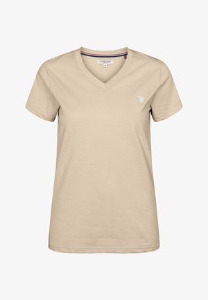 Béžové dámske tričko s krátkym rukávom a V-výstrihom, s malým bielym vyšívaným logom na ľavej strane hrudníka od značky U.S. Polo Assn., veľkosť stredná.