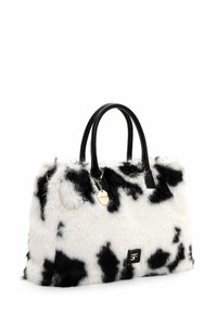 Torebka w cow-print z czarnymi skórzanymi uchwytami, wykonana z miękkiego, puszystego materiału. Posiada mały srebrny tag oraz usztywnioną konstrukcję.