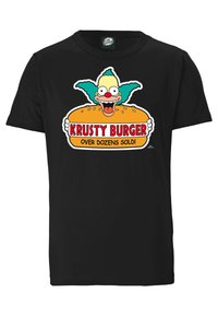 Black cotton t-shirt featuring a colorful graphic of a clown holding a burger, with the text "Krusty Burger" and "Over Dozens Sold!" in red and yellow.