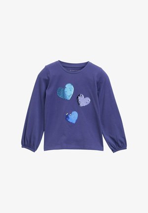 Dolgi rokavi vijolična majica z velikimi srci iz sequins v različnih odtenkih modre barve. Okrogla ovratnica in nabrani manšeti. Mehko bombažno blago.