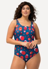 Eénstuk zwempak in het blauw met een levendig patroon van rode en roze cirkels. Beschikt over brede schouderbanden en een vierkante halslijn voor extra bedekking.