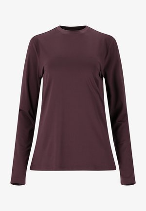 Pitkähihainen paita tumman burgundin värissä, valmistettu sileästä kankaasta. Ominaisuuksiin kuuluu pyöreä kaula-aukko ja rento malli, ilman näkyviä kuvioita tai koristeita.