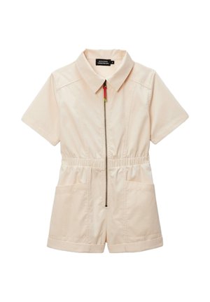 Rompers beige à manches courtes avec col, fermeture éclair sur le devant avec tirant rouge, taille élastique et deux poches appliquées à l'avant.