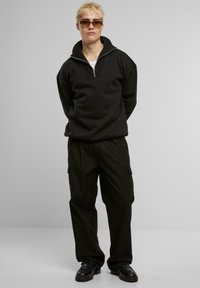 Urban Classics WIDE  - Cargobukse - black
