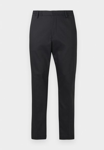 Schwarze Hose mit elastischem Bund, schmal zulaufenden Beinen und einem glatten Baumwollmix. Minimalistisches Design ohne zusätzliche Muster.