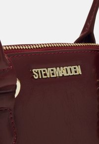 Steve Madden Käekott - bodeaux