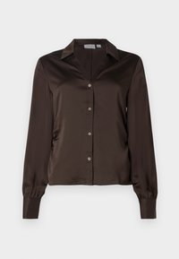 Tumepruun siidist pika varrukaga pluus, millel on nupud ees, terav krae ja laiad mansetid.