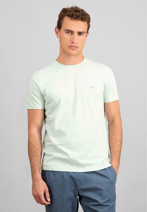 Light green cotton short-sleeve t-shirt with a crew neckline, featuring a small blue logo on the chest and a relaxed fit.