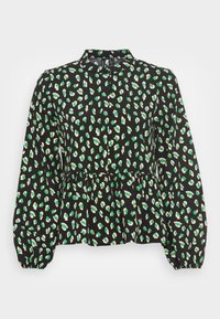 Blusa preta com estampado de leopardo verde e creme, apresentando um design peplum, decote alto e mangas longas bufantes. Textura de tecido suave.