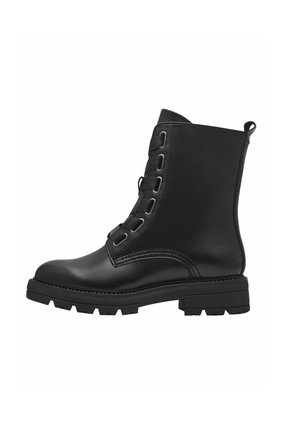 Bottines en cuir noir avec un bout arrondi, un laçage à l'avant, des œillets métalliques et une semelle texturée. Présentent une languette à l'arrière.