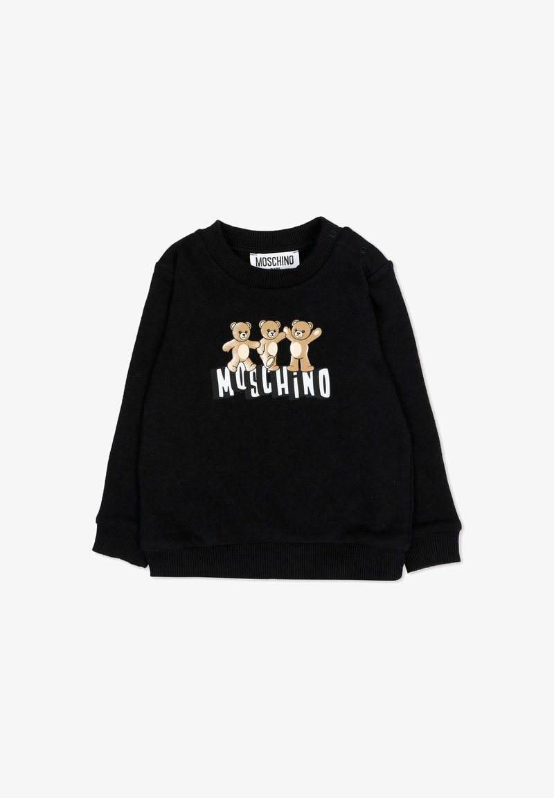 Pull bébé noir à manches longues avec trois ours en peluche au-dessus du logo blanc « MOSCHINO » sur le devant.