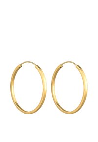 Orecchini a cerchio in oro con una finitura liscia e lucida e forma circolare. Presentano una chiusura a cerniera sicura e sono realizzati in metallo.