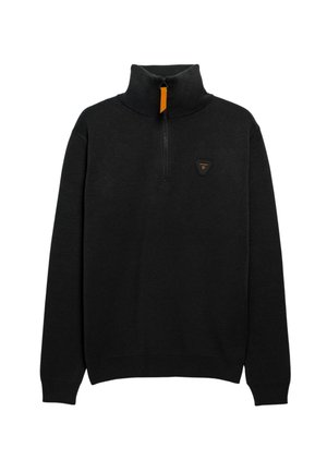 Pull en tricot noir avec un col montant et une fermeture éclair mi-longue. Présente un petit logo triangulaire sur la poitrine ainsi que des poignets et un ourlet côtelés.