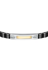 Bracciale in metallo nero con accenti in argento e oro. Presenta un centro rettangolare in oro e due pietre trasparenti su ciascun lato. Superficie liscia e lucida.