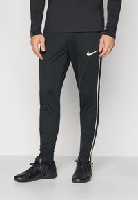 Nike Performance - PANT - Treniņtērpa apakšdaļas - black/white Miniatūras attēls 1