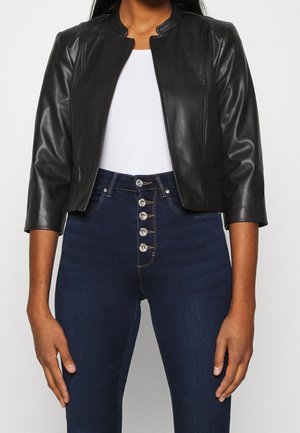 Jacka i konstläder - black