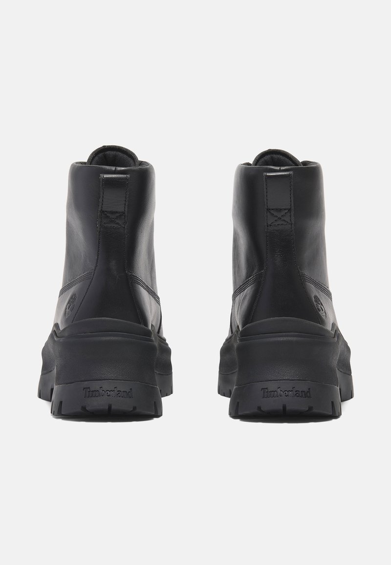 Timberland Kotníkové boty na platformě - black full grain