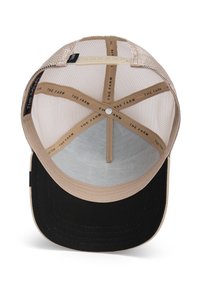 Gorra de béisbol con una corona de malla color beige, visera negra y forro interior que presenta el texto repetido "THE FARM". Cierre ajustable de plástico a presión.