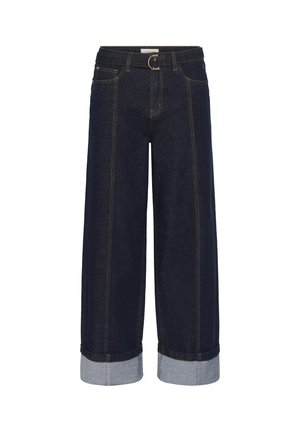 Pantalons cropped en denim bleu foncé avec une coupe large, présentant des ourlets retroussés en denim plus clair et des coutures dorées le long des coutures.