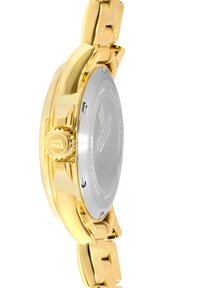 Zlato-tonirana ročna ura z okroglo ohišjem, hrbtno stranjo iz nerjavečega jekla in strukturirano krono. Ima povezano obliko zapestnice.