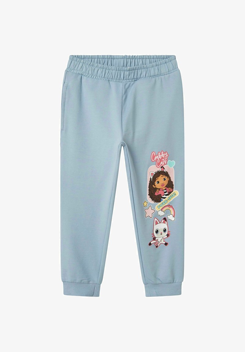 Svijetloplave trenirke s elastikom u struku, koje imaju šarene grafičke otiske likova, zvjezdica i srca na lijevoj nozi.