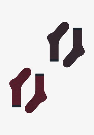 Gestreifte Socken in Dunkelrot und Marineblau, mit einer gerippten Textur, kontrastierenden einfarbigen Bündchen und einem klassischen Design für eine bequeme Passform.