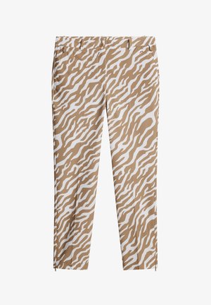 Bežīgas bikses ar baltu zebras rakstu, ar taisnu piegriezumu, sānu kabatām un rāvējslēdzējiem pie potītēm. Izgatavotas no gludas auduma.