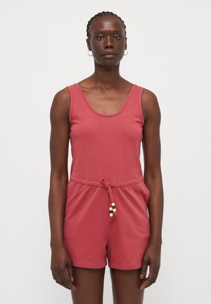 Combinaison rouge sans manches avec un col arrondi et une taille à cordon. Fabriquée en tissu doux, avec de petites perles sur le cordon.