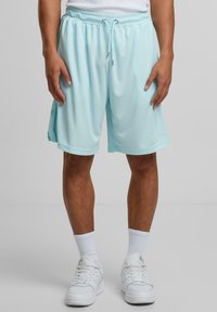 Karl Kani SIGNATURE TAPE - Tracksuit bottoms - lightaqua