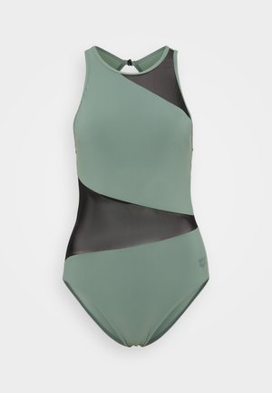 Maillot de bain une pièce vert doux avec accents en mesh noir. Caractérisé par un col montant et un design à blocs de couleurs diagonales pour une coupe structurée.