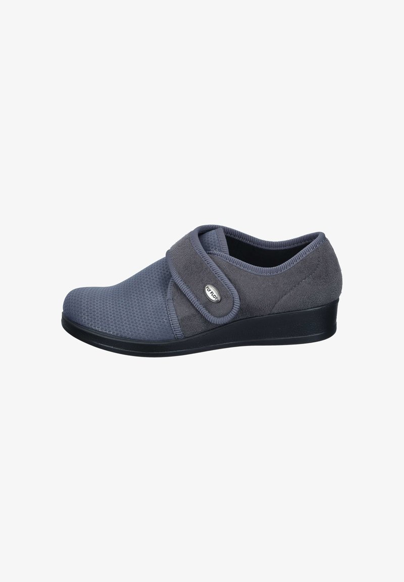 Gray fabric shoes with a textured mesh front and soft suede accents. Features a wide Velcro strap and a low, black wedge sole.