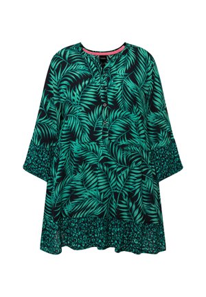 Groene top met bladmotief op een zwarte achtergrond, met een ronde halslijn, knopenlijst en een gerimpelde zoom met een teal luipaardprintaccent.