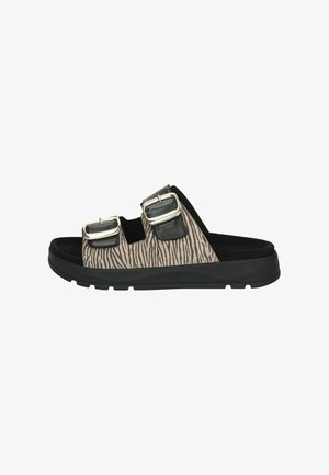 Zwart-beige plateau sandalen met een zebraprint, twee gespsluitingen en een gestructureerd bovenwerk. Rubberzool voor grip en comfort.