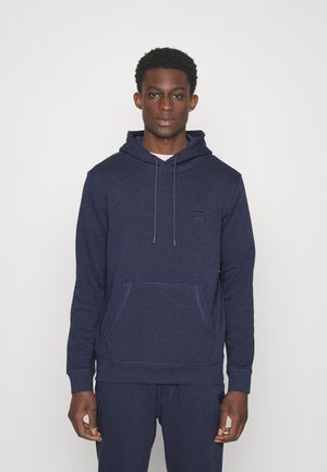 Felpa con cappuccio di un blu navy realizzata in morbido tessuto, con tasca frontale, cappuccio regolabile con cordino e un sottile logo applicato. Design semplice e confortevole.