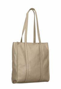 Sac fourre-tout en cuir beige avec deux poignées, surface texturée, coutures verticales et un intérieur spacieux sans fermetures visibles.