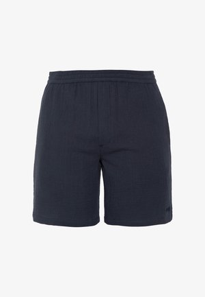 Pantalones cortos de tela texturizada azul marino con cintura elástica y dobladillo recto, diseñados para uso casual.
