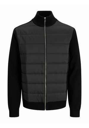 Black zip-up jacket featuring a padded upper section and knitted sleeves. It has a high collar and flat seams, creating a textured appearance.